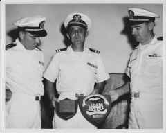 1966 AUG - USNS Tarlac Change of Command (LT Kirkwood LT WMP holding plaques & LCDR Goddard).JPG (1714425 bytes)